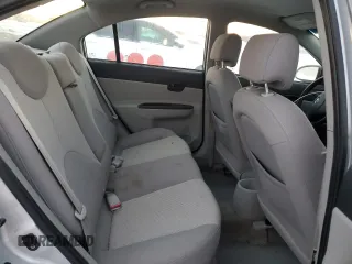 2007 Hyundai Accent GL z VIN KMHCN45CX7U127037, wystawiony jako Copart lot #86041984 z przebiegiem 212 828 mil mil oraz Szkoda całkowita • Salvage title. Historia ofert i sprzedaży dostępna na DreamBid. Obrazek 10.