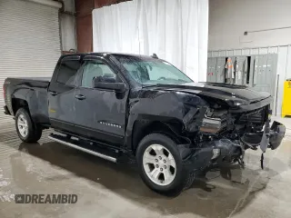 2017 Chevrolet Silverado 1500 LT with VIN 1GCVKREC0HZ141018, listed as a Copart auction lot 52708255 with 96,790 mi miles and Salvage Title. Bid and sale history available at DreamBid. Image 4.
