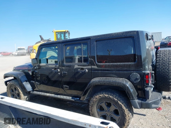 2017 Jeep Wrangler Unlimited Rubicon Recon с VIN 1C4HJWFG0HL737779, выставлен на аукционе IAAI как лот 41396395 с пробегом 125 845 миль миль и . История ставок и продаж доступна на DreamBid. Изображение 14.