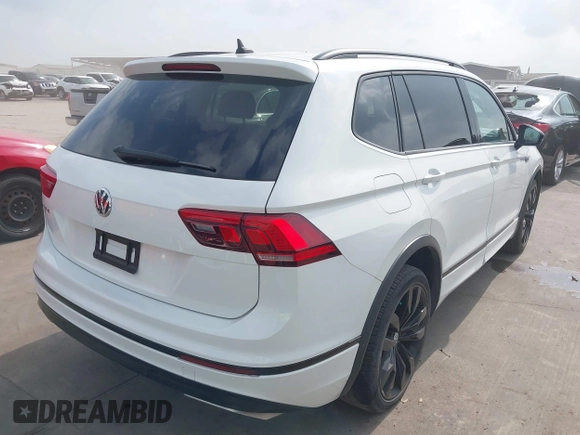 2021 Volkswagen Tiguan SE with VIN 3VV3B7AX9MM003432, listed as a IAAI auction lot 41914477 with 64,530 mi miles and . Bid and sale history available at DreamBid. Image 4.