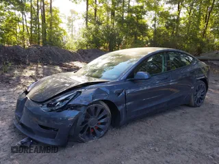 2022 Tesla Model 3 Performance with VIN 5YJ3E1EC7NF329679, listed as a IAAI auction lot 40555901 with 32,552 mi miles and . Bid and sale history available at DreamBid. Image 17.