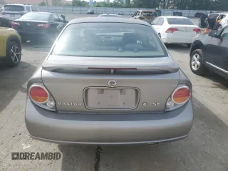 2002 Nissan Maxima GXE z VIN JN1DA31D72T429500, wystawiony jako Copart lot #57996385 z przebiegiem 59 237 mil mil oraz Szkoda całkowita • Salvage title. Historia ofert i sprzedaży dostępna na DreamBid. Obrazek 6.