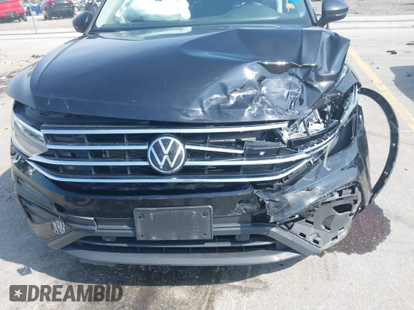 2022 Volkswagen Tiguan SE with VIN 3VV2B7AX0NM146315, listed as a IAAI auction lot 42512975 with 40,577 mi miles and . Bid and sale history available at DreamBid. Image 6.