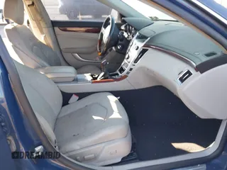 2009 Cadillac CTS AWD w/1SB with VIN 1G6DT57V290143815, listed as a IAAI auction lot 42000863 with 139,340 mi miles. Bid and sale history available at carsss.com. Image 5.