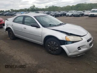2001 Dodge Stratus z VIN 1B3EJ46U61N522786, wystawiony jako Copart lot #55478205 z przebiegiem 88 051 mil mil oraz Szkody całkowita. Historia ofert i sprzedaży dostępna na DreamBid. Obrazek 4.