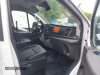 2021 Ford Transit Cargo with VIN 1FTBR1Y87MKA76372, listed as a IAAI auction lot 42251675 with 98,072 mi miles and . Bid and sale history available at DreamBid. Image 5.