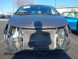 2015 Honda Odyssey EX-L with VIN 5FNRL5H61FB126933, listed as a IAAI auction lot 42003978 with 69,025 mi miles and . Bid and sale history available at carsss.com. Image 6.