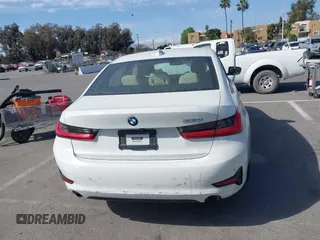 2019 BMW 3 Series 330i with VIN WBA5R1C55KAK12332, listed as a IAAI auction lot 41692035 with 13,657 mi miles and . Bid and sale history available at DreamBid. Image 16.