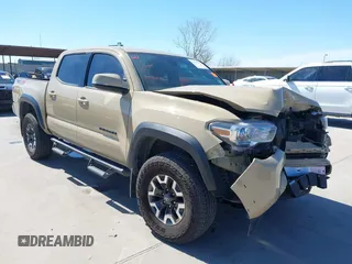 2020 Toyota Tacoma SR5 z VIN 3TMCZ5AN3LM297518, wystawiony jako IAAI lot #41871601 z przebiegiem 92 329 mil mil oraz . Historia ofert i sprzedaży dostępna na DreamBid. Obrazek 1.