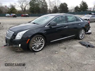2014 Cadillac XTS Platinum z VIN 2G61T5S38E9163835, wystawiony jako Copart lot #48147124 z przebiegiem 121 944 mil mil oraz Szkoda całkowita • Salvage title. Historia ofert i sprzedaży dostępna na DreamBid. Obrazek 1.