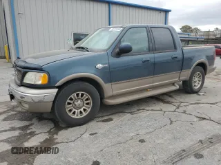2001 Ford F-150 XLT with VIN 1FTRW07LX1KA18940, listed as a Copart auction lot 50723495 with 133,686 mi miles and Salvage title. Bid and sale history available at DreamBid. Image 1.