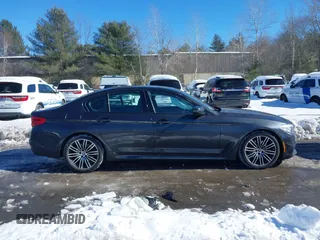 2019 BMW 5 Series 530i xDrive with VIN WBAJA7C50KWW05263, listed as a IAAI auction lot 41571583 with 71,185 mi miles and . Bid and sale history available at DreamBid. Image 13.