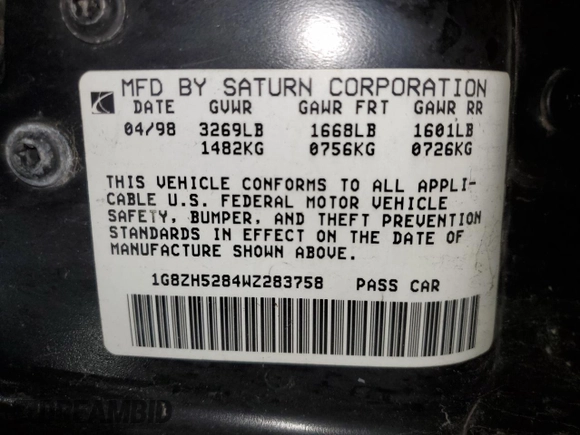 1998 Saturn SL with VIN 1G8ZH5284WZ283758, listed as a Copart auction lot 51630555 with 200,690 mi miles and Salvage title. Bid and sale history available at DreamBid. Image 15.
