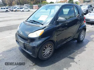 2012 Smart fortwo Pure z VIN WMEEJ3BA1CK556029, wystawiony jako IAAI lot #42173735 z przebiegiem 85 133 mil mil oraz . Historia ofert i sprzedaży dostępna na DreamBid. Obrazek 17.