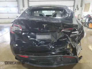 2022 Tesla Model Y Performance z VIN 7SAYGDEF7NF523532, wystawiony jako Copart lot #59949915 z przebiegiem 50 428 mil mil oraz Szkoda całkowita • Salvage title. Historia ofert i sprzedaży dostępna na DreamBid. Obrazek 6.