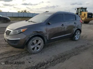 2013 Kia Sportage LX with VIN KNDPB3A23D7465413, listed as a Copart auction lot 83694894 with 122,467 mi miles and Salvage Title. Bid and sale history available at carsss.com. Image 1.