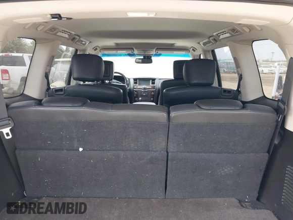 2014 Infiniti QX80 z VIN JN8AZ2NF1E9552567, wystawiony jako IAAI lot #40608266 z przebiegiem 94 809 mil mil oraz . Historia ofert i sprzedaży dostępna na DreamBid. Obrazek 8.