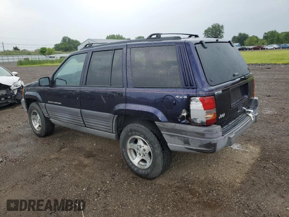 1998 Jeep Grand Cherokee Laredo with VIN 1J4GZ58SXWC144437, listed as a Copart auction lot 60437094 with 183,908 mi miles and Salvage Title. Bid and sale history available at carsss.com. Image 2.
