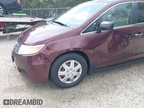 2013 Honda Odyssey LX with VIN 5FNRL5H25DB080209, listed as a IAAI auction lot 42123644 with 157,631 mi miles and . Bid and sale history available at carsss.com. Image 6.