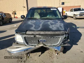 2000 Ford F-150 XL with VIN 1FTRX17L4YNA56465, listed as a Copart auction lot 42381515 with 0 mi miles and Salvage Title. Bid and sale history available at carsss.com. Image 5.