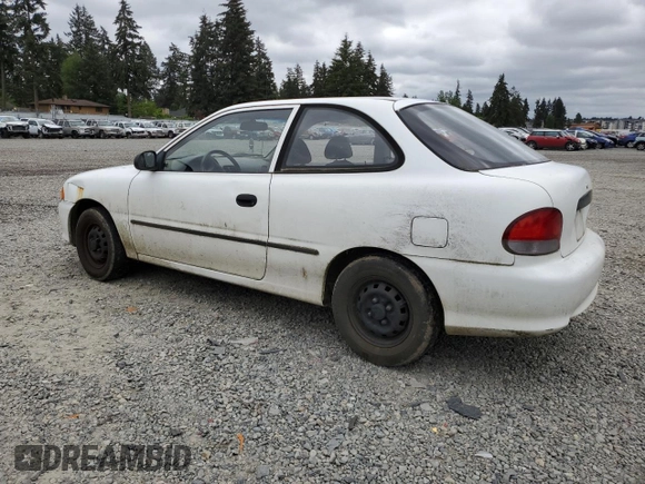 1999 Hyundai Accent with VIN KMHVD14N9XU503210, listed as a Copart auction lot 56486325 with 195,501 mi miles and Salvage title. Bid and sale history available at DreamBid. Image 2.