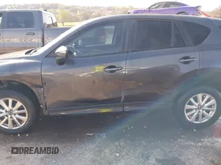 2016 Mazda CX-5 Touring with VIN JM3KE4CY3G0672977, listed as a IAAI auction lot 41889137 with 130,593 mi miles. Bid and sale history available at carsss.com. Image 15.