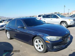 2014 BMW 3 Series 328i with VIN WBA3C1C58EK115326, listed as a IAAI auction lot 42403532 with 135,348 mi miles and . Bid and sale history available at DreamBid. Image 1.