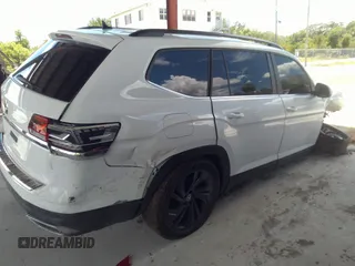 2022 Volkswagen Atlas SE z VIN 1V2WR2CA6NC544975, wystawiony jako IAAI lot #39643571 z przebiegiem 42 210 mil mil oraz . Historia ofert i sprzedaży dostępna na DreamBid. Obrazek 13.