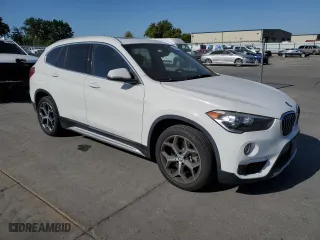 2019 BMW X1 xDrive28i with VIN WBXHT3C53K5L35670, listed as a Copart auction lot 53493245 with 14,201 mi miles and Salvage Title. Bid and sale history available at carsss.com. Image 4.