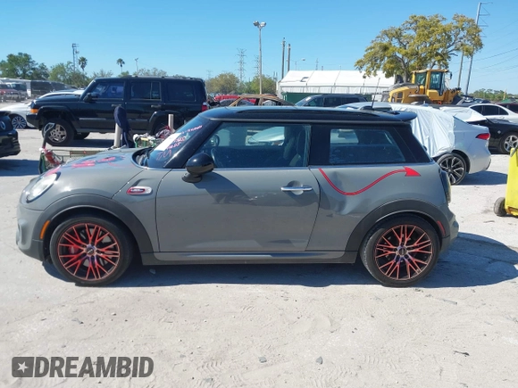 2016 MINI Hardtop John Cooper Works with VIN WMWXM9C58GT996815, listed as a IAAI auction lot 41756661 with 146,450 mi miles and . Bid and sale history available at DreamBid. Image 14.