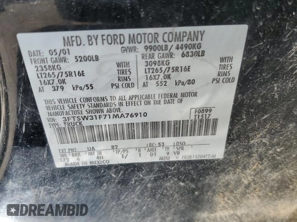 2001 Ford F-350 XL with VIN 3FTSW31F71MA76910, listed as a Copart auction lot 53083565 with 239,213 mi miles and Salvage Title. Bid and sale history available at DreamBid. Image 12.
