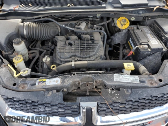 2014 Dodge Grand Caravan SE with VIN 2C4RDGBG0ER136799, listed as a Copart auction lot 45430905 with 148,309 mi miles and Clean Title. Bid and sale history available at DreamBid. Image 12.
