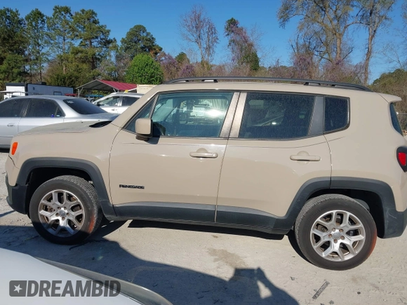 2015 Jeep Renegade Latitude with VIN ZACCJBBT0FPB67030, listed as a IAAI auction lot 41866195 with 120,618 mi miles. Bid and sale history available at carsss.com. Image 14.