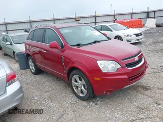 2014 Chevrolet Captiva Sport LT z VIN 3GNAL3EK7ES546647, wystawiony jako IAAI lot #42200647 z przebiegiem 146 323 mil mil oraz . Historia ofert i sprzedaży dostępna na DreamBid. Obrazek 1.
