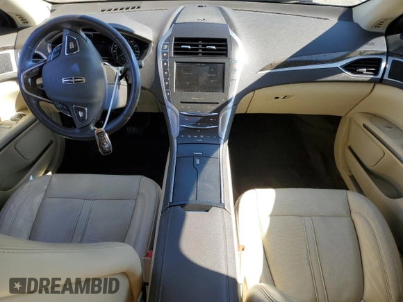 2015 Lincoln MKZ z VIN 3LN6L2JK1FR604092, wystawiony jako Copart lot #48379525 z przebiegiem 64 656 mil mil oraz Szkoda całkowita • Salvage title. Historia ofert i sprzedaży dostępna na DreamBid. Obrazek 8.