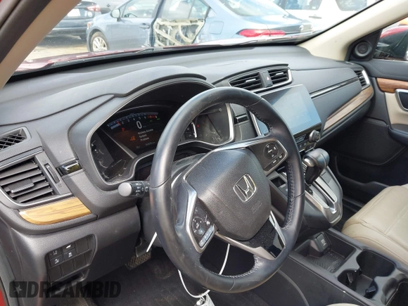2018 Honda CR-V EX-L z VIN 2HKRW2H83JH651686, wystawiony jako IAAI lot #42356284 z przebiegiem 60 550 mil mil oraz . Historia ofert i sprzedaży dostępna na DreamBid. Obrazek 18.