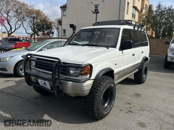 1997 Mitsubishi Montero z VIN JA4MR41R3VJ007919, wystawiony jako Copart lot #51544685 z przebiegiem 268 046 mil mil oraz Czysty tytuł • Clean title. Historia ofert i sprzedaży dostępna na DreamBid. Obrazek 2.