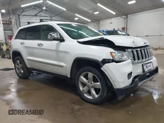 2013 Jeep Grand Cherokee Overland with VIN 1C4RJFCT1DC586886, listed as a IAAI auction lot 41941590 with 125,126 mi miles. Bid and sale history available at carsss.com. Image 1.