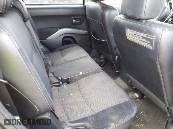 2012 Mitsubishi Outlander SE z VIN JA4AS3AW4CU006815, wystawiony jako IAAI lot #41652578 z przebiegiem 130 000 mil mil oraz . Historia ofert i sprzedaży dostępna na DreamBid. Obrazek 8.