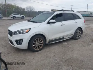 2016 Kia Sorento SX z VIN 5XYPKDA59GG113511, wystawiony jako IAAI lot #41997346 z przebiegiem 140 017 mil mil oraz . Historia ofert i sprzedaży dostępna na DreamBid. Obrazek 20.