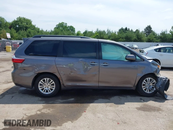 2015 Toyota Sienna XLE with VIN 5TDYK3DCXFS633128, listed as a IAAI auction lot 42527073 with 149,926 mi miles and . Bid and sale history available at DreamBid. Image 14.