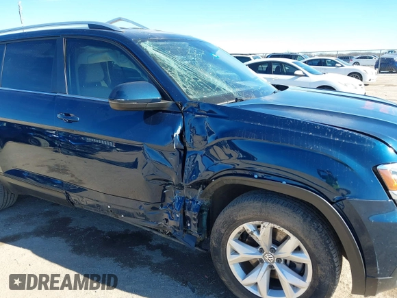 2019 Volkswagen Atlas SE with VIN 1V2DR2CA9KC506188, listed as a IAAI auction lot 41221389 with 67,593 mi miles and . Bid and sale history available at DreamBid. Image 6.