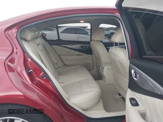 2014 Infiniti Q50 Premium z VIN JN1BV7AP8EM673359, wystawiony jako IAAI lot #42300427 z przebiegiem 118 779 mil mil oraz . Historia ofert i sprzedaży dostępna na DreamBid. Obrazek 8.