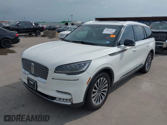2020 Lincoln Aviator Reserve with VIN 5LM5J7WC1LGL28593, listed as a IAAI auction lot 42137327 with 83,114 mi miles and . Bid and sale history available at DreamBid. Image 2.