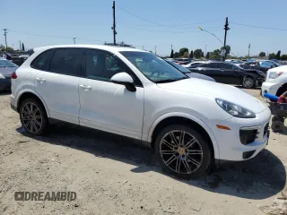 2018 Porsche Cayenne z VIN WP1AA2A29JKA01259, wystawiony jako Copart lot #55061165 z przebiegiem 100 451 mil mil oraz Czysty tytuł • Clean title. Historia ofert i sprzedaży dostępna na DreamBid. Obrazek 4.
