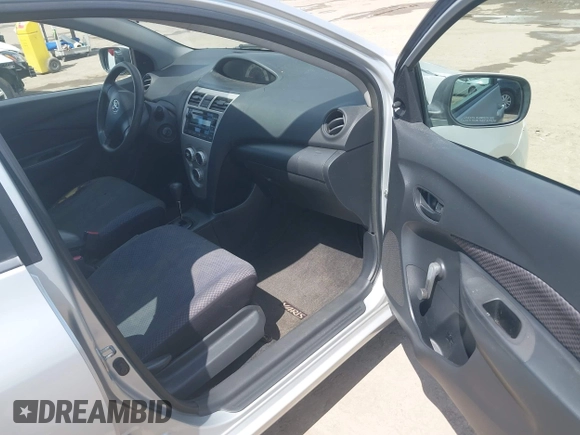 2007 Toyota Yaris with VIN JTDBT923871051021, listed as a IAAI auction lot 42126812 with 316,556 mi miles. Bid and sale history available at carsss.com. Image 5.