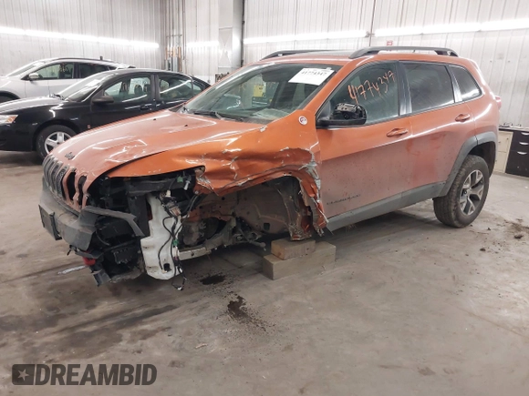 2015 Jeep Cherokee Trailhawk with VIN 1C4PJMBS5FW524462, listed as a IAAI auction lot 41774347 with 107,592 mi miles. Bid and sale history available at carsss.com. Image 18.