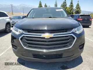 2021 Chevrolet Traverse LS with VIN 1GNERFKWXMJ242575, listed as a Copart auction lot 57480565 with 105,810 mi miles and Salvage title. Bid and sale history available at DreamBid. Image 5.