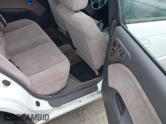 1996 Subaru Legacy with VIN 4S3BD4559T7202906, listed as a IAAI auction lot 42214410 with 211,118 mi miles and . Bid and sale history available at DreamBid. Image 8.