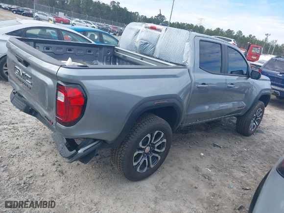 2024 GMC Canyon 4WD AT4 with VIN 1GTP6DEK6R1202153, listed as a IAAI auction lot 41583339 with 10,891 mi miles. Bid and sale history available at carsss.com. Image 4.